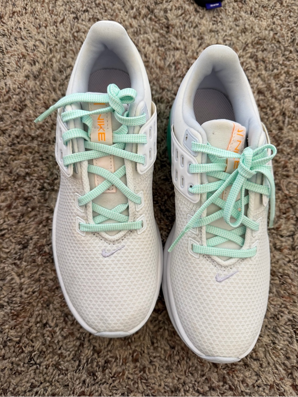 Nike Kids White Sneakers with Mint Laces and Orange Logo